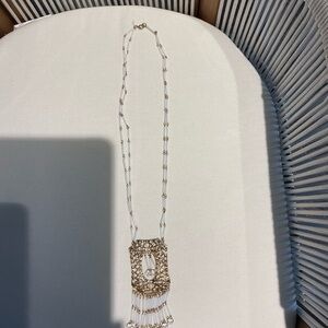 Elegant Gold and White Necklace